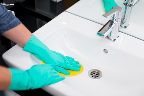 Local technician treating a carpet stain in Kensington