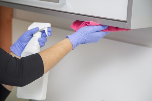 Professional cleaner reviewing safety checks and site hazards before cleaning